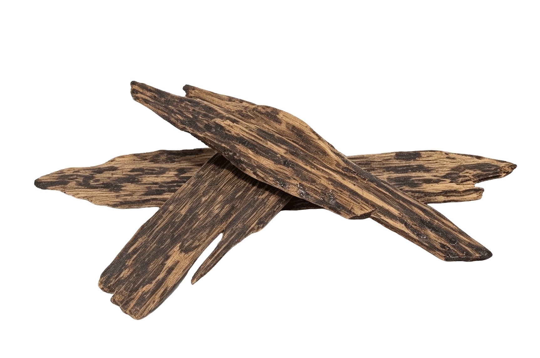 Resin-rich agarwood material showing dense dark resin patterns